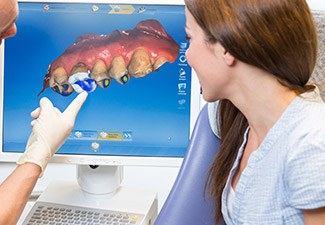 woman at consult with dentist