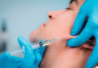 Man receiving dermal fillers in Leawood