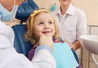 young girl getting checkup