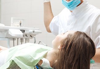 dentist showing patient something