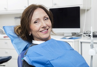 Woman smiling in dental chair