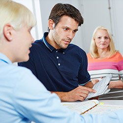 man signing up for membership