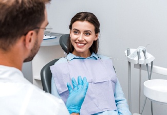 Dentist in Leawood speaking with a patient