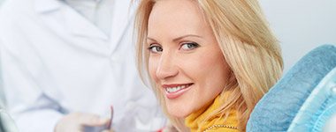 woman smiling in exam chair