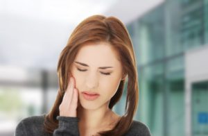 woman with jaw pain