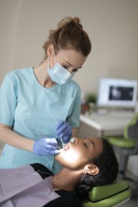 Dental hygienist at dentist in Leawood.